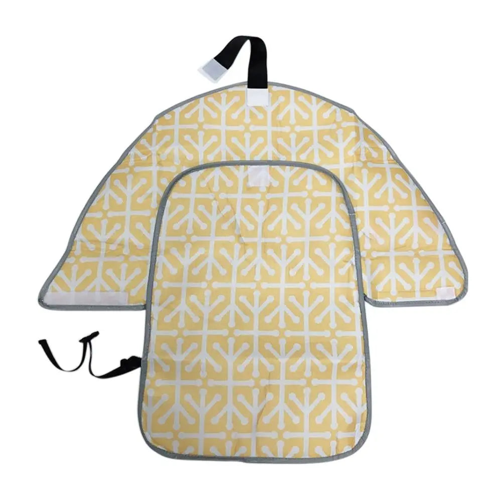 Foldable Baby Essentials-4 diaper bag with built-in crib, gray fabric, multiple compartments, and adjustable straps for convenient travel.