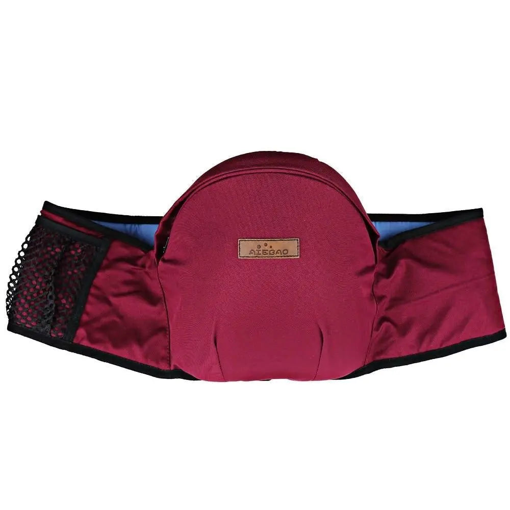 Baby Essentials-4 baby hip seat carrier with comfortable waist belt, showing a parent wearing the supportive baby carrier.