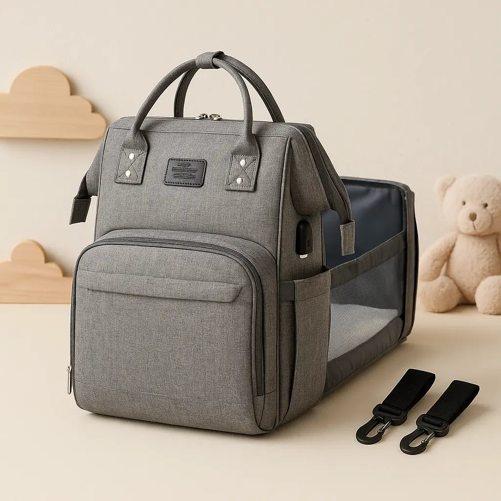 Baby Essentials-4 baby diaper bag with USB port and sleeping crib, showcasing a stylish, functional diaper bag in a studio shot.