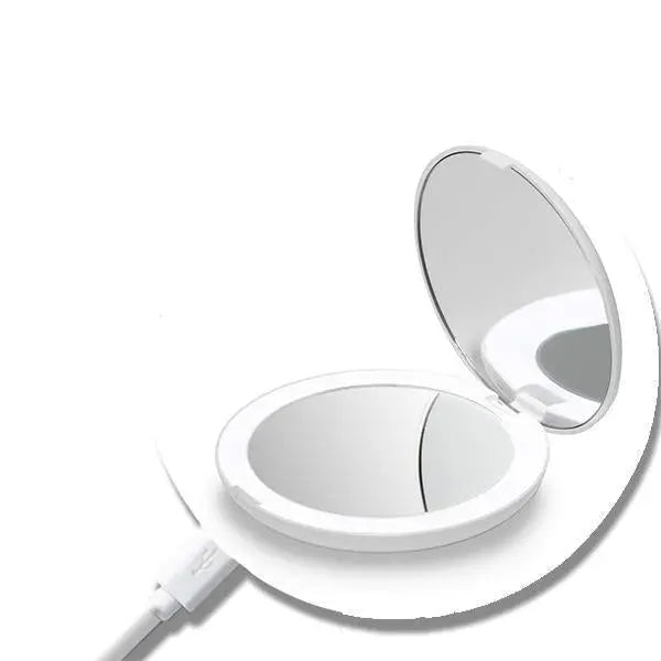 Rechargeable LED handheld makeup mirror by Health & Beauty-5 with bright LED lighting and sleek ergonomic design.