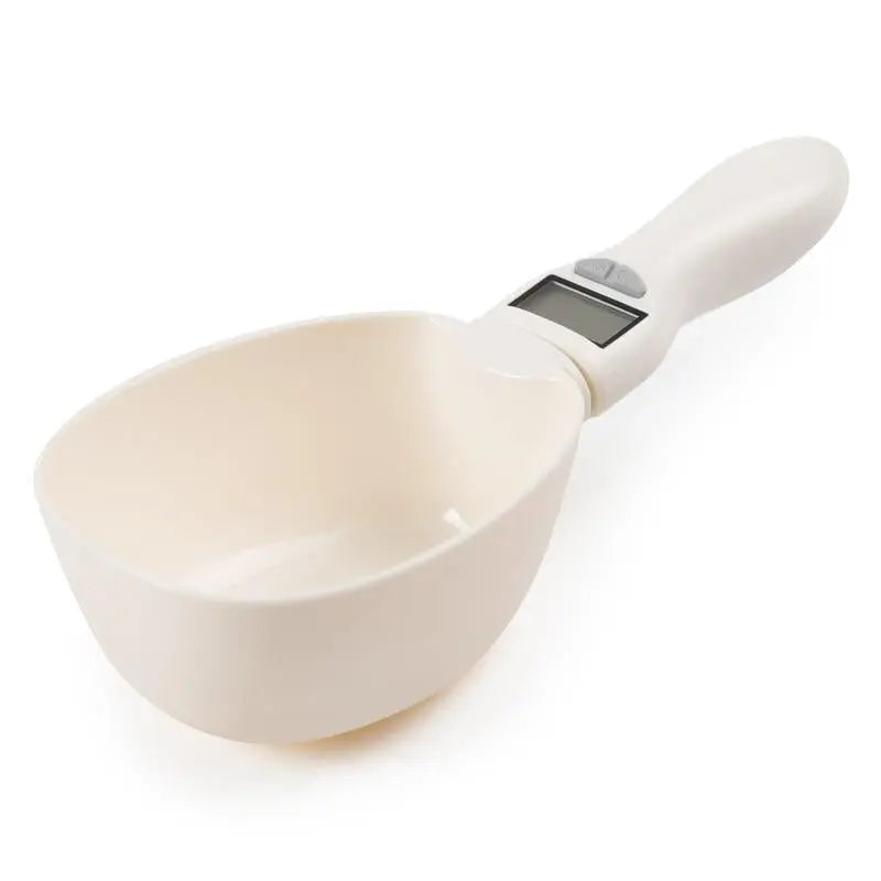 Pet Essentials-11 smart pet food measuring scoop with digital display and ergonomic handle for accurate feeding portions.