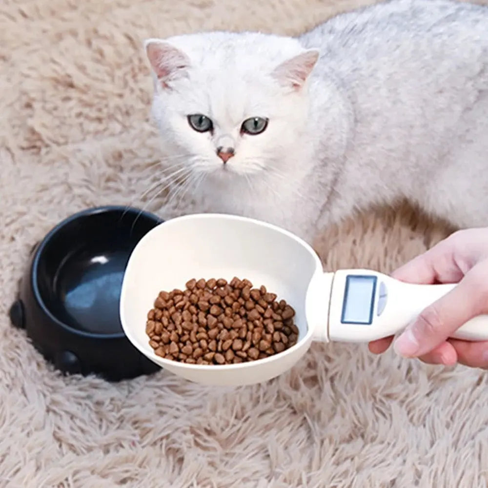 Pet Essentials-11 smart pet food measuring scoop with 500g capacity, features a digital scale and portable design for precise feeding.
