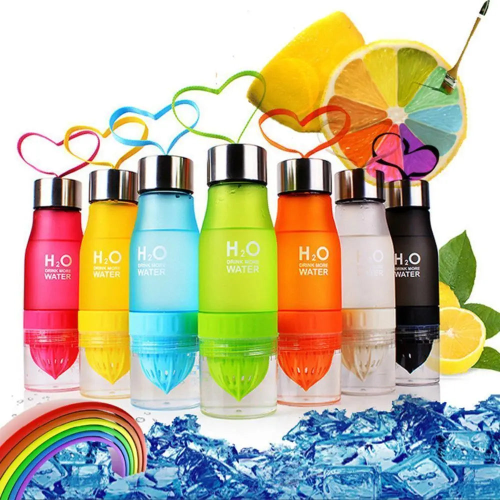 Fitness-6 H²O Fruit Infuser Water Bottle filled with fresh fruit and water, showing the infuser chamber and sleek design.