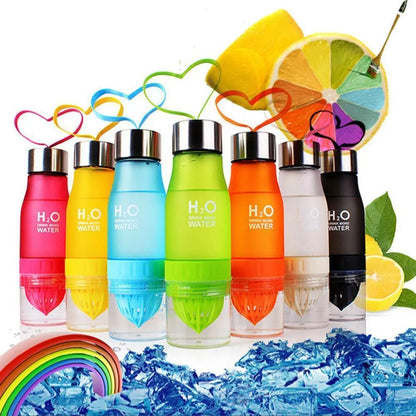 Fitness-6 H²O Fruit Infuser Water Bottle filled with fresh fruit and water, showing the infuser chamber and sleek design.