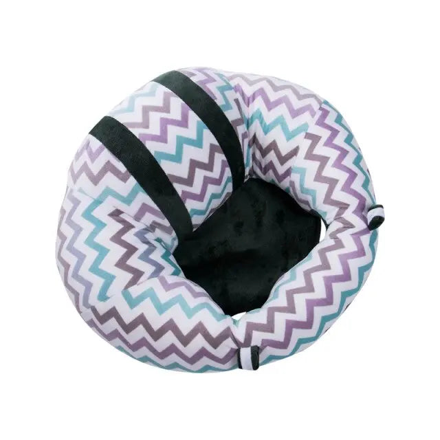 Baby Essentials-4 soft sit-up support seat with plush cushion, featuring a colorful animal toy for infant and toddler comfort.