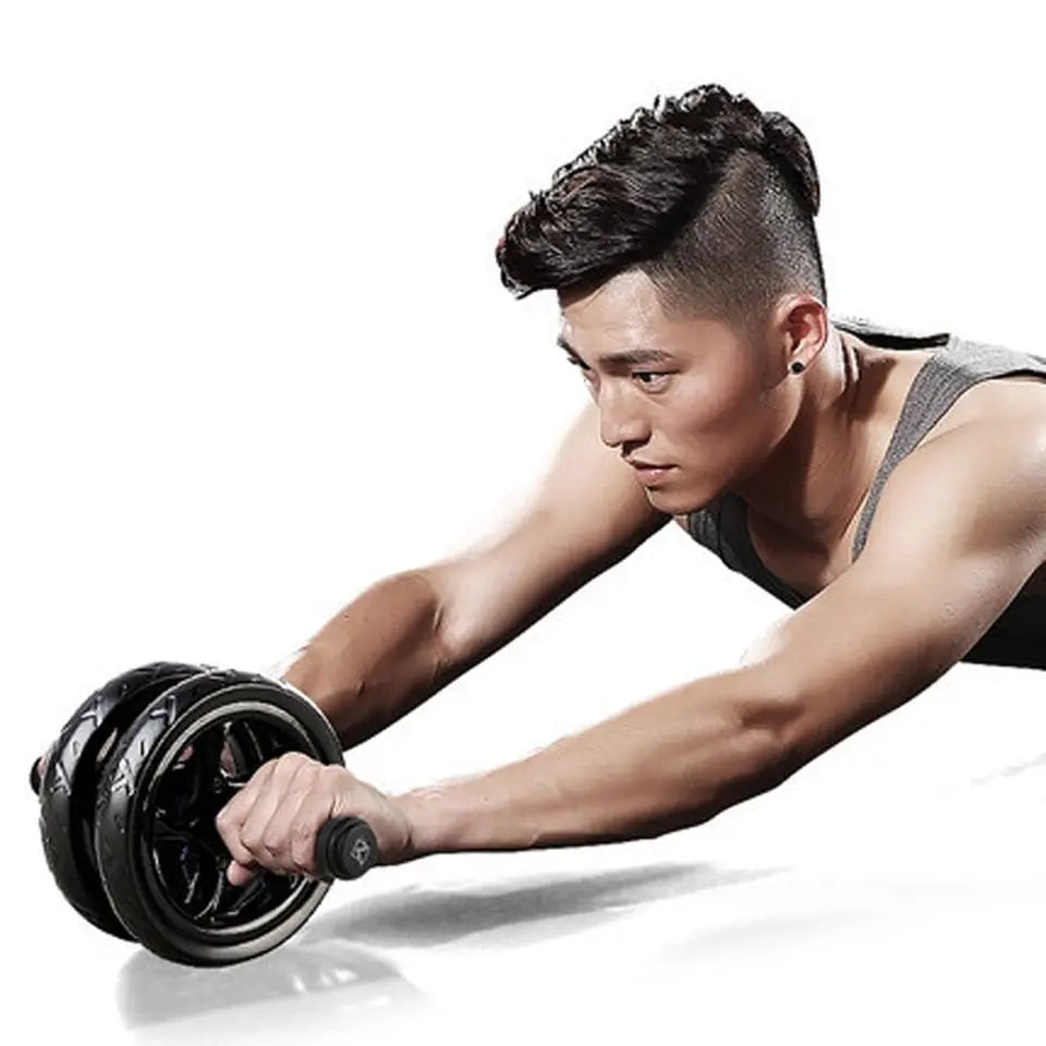Double wheel Ab roller trainer by Fitness-6 for core workouts and muscle building, featuring ergonomic handles and durable design.
