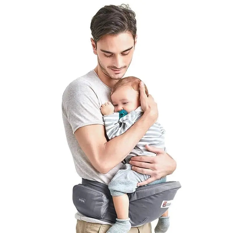 Baby Essentials-4 ergonomic baby hip seat carrier with waist belt, backpack-style design for comfortable baby carrying and support.