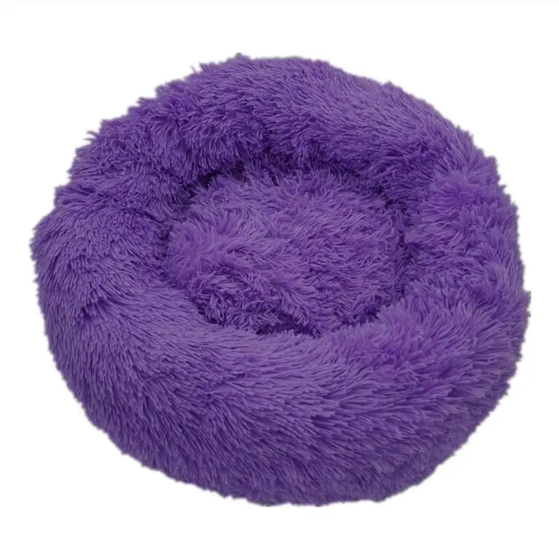 Soft Pet Essentials-11 Calming Donut Bed for dogs and cats, plush round shape with cushioned edges and cozy interior.