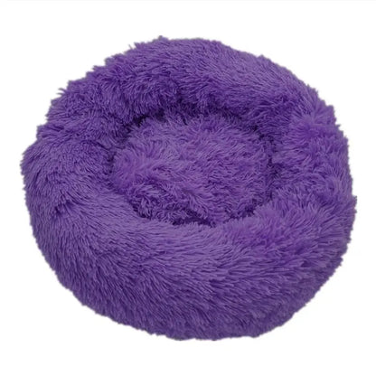 Soft Pet Essentials-11 Calming Donut Bed for dogs and cats, plush round shape with cushioned edges and cozy interior.
