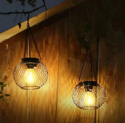 Outdoor solar lantern by Zenn Organics Inc, waterproof hanging light with decorative design, ideal for outdoor lighting.