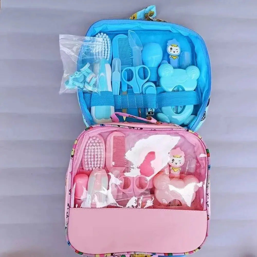 Set of 13 Zenn Organics Inc baby care tools including hair wash brush, nail clippers, nasal aspirator, comb, and newborn care essentials.