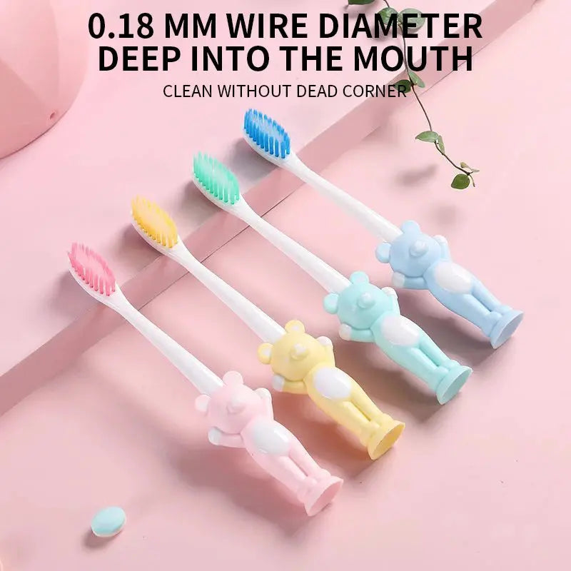 Set of four Little Bear suction cup children's toothbrushes by Zenn Organics Inc, featuring colorful handles and suction cups for easy gripping.