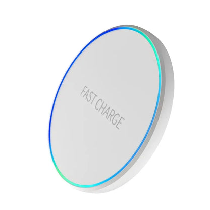 Wireless charging pad for phone, iPad, watch, and earphones by Zenn Organics Inc, showing a sleek fast charging dock station with devices in use.