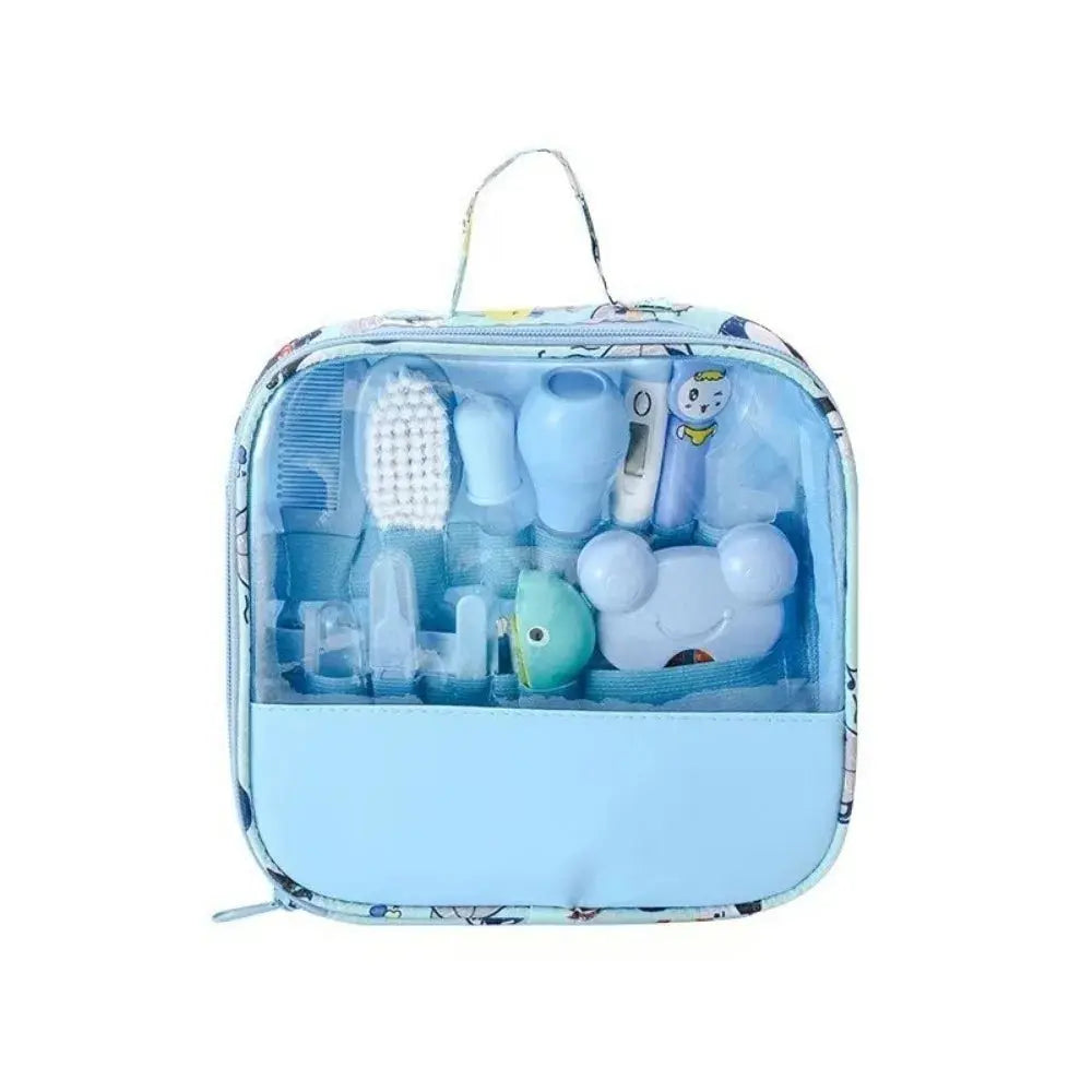 Zenn Organics Inc 13-piece baby care kit including hair wash brush, nail clipper, nasal aspirator, comb, and newborn care essentials.