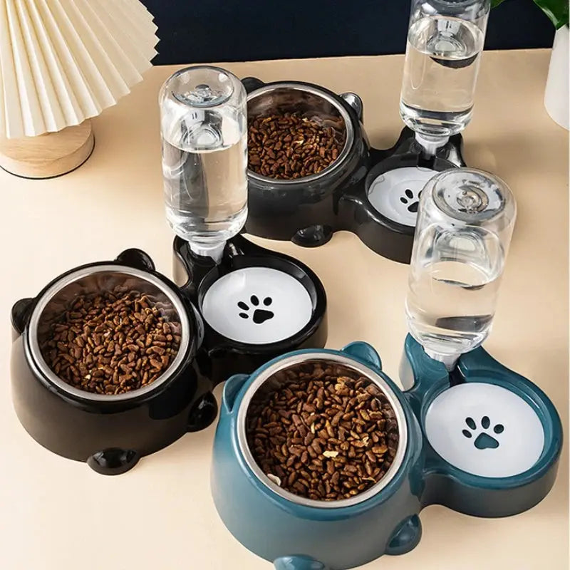 Automatic pet feeder and water dispenser by Zenn Organics Inc, with slanted mouth for easy feeding for cats and dogs.