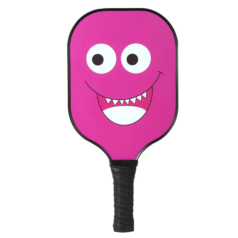 Zenn Organics Inc graphite pickleball paddles set with four USAPA approved rackets and a cricket ball on outdoor court.