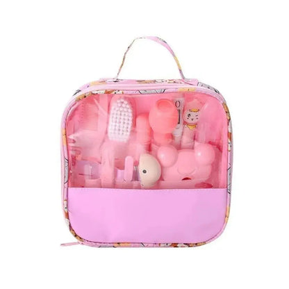 Zenn Organics Inc 13-piece baby care kit including hair wash brush, nail clipper, nasal aspirator, comb, and newborn essentials.