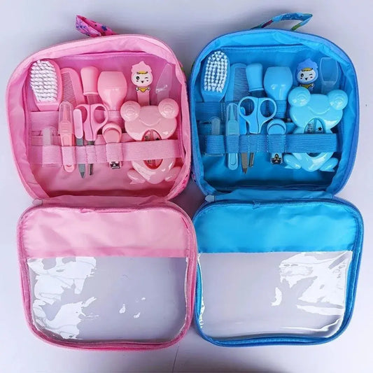 Set of 13 Zenn Organics Inc baby care essentials including hair wash brush, nail clipper, nasal aspirator, comb, and newborn care tools
