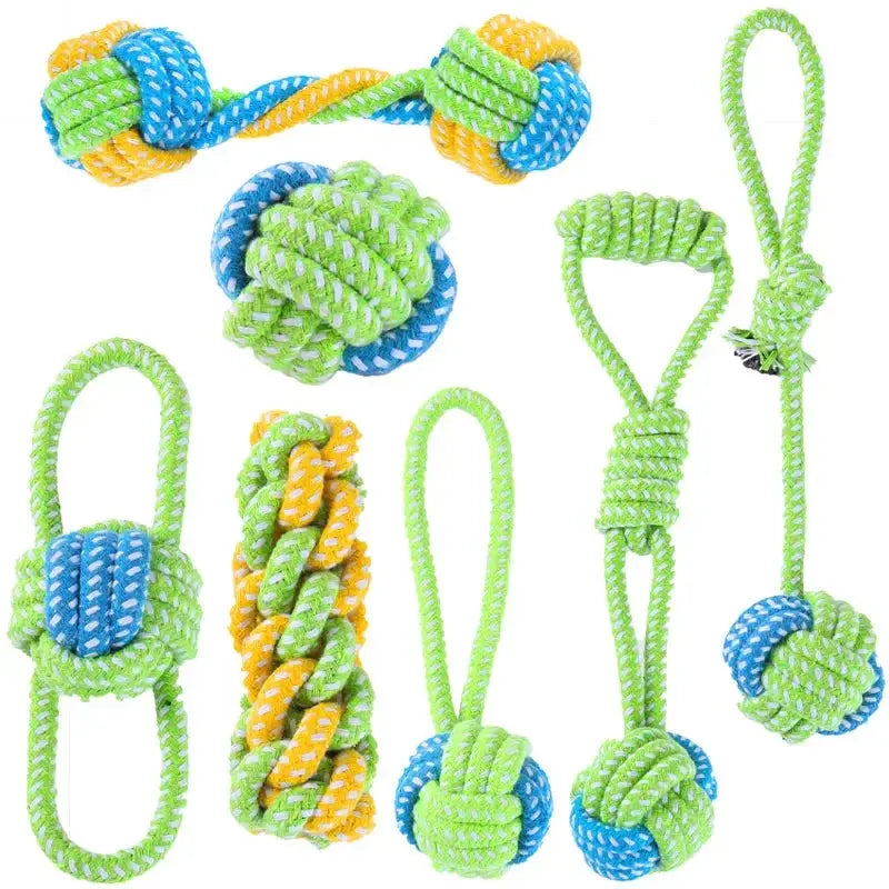 Small and large dog toy set featuring cotton rope, ball, and toothbrush chew toy for puppies and active dogs by Zenn Organics Inc.