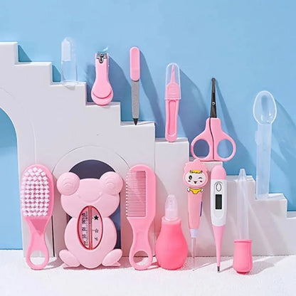 Set of 13 baby care tools including hair wash brush, nail clippers, nasal aspirator, comb, and newborn care essentials by Zenn Organics Inc.