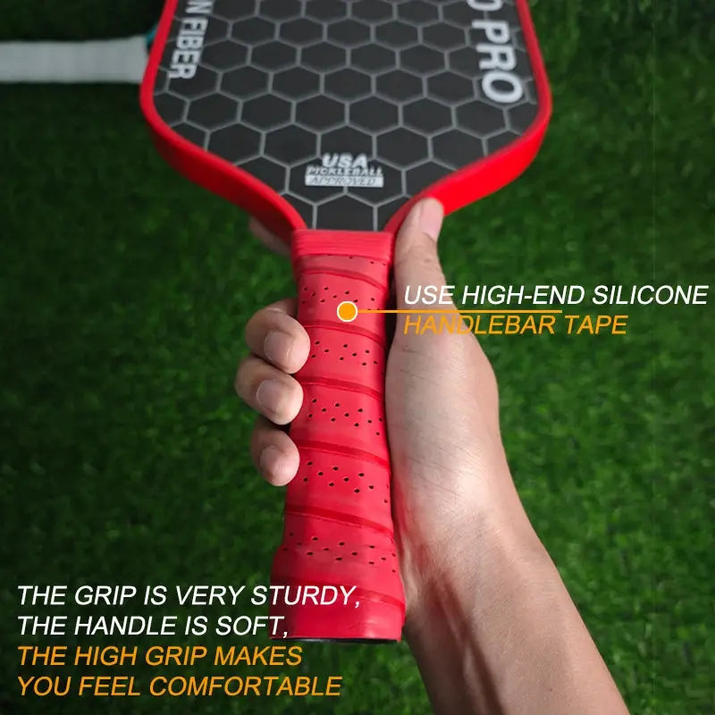 Zenn Organics T700 Carbon Pickleball Paddle with black and red design and ergonomic handle on a neutral background.