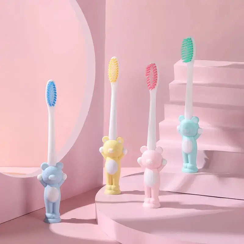 Set of four Little Bear Suction Cup Children's Toothbrushes by Zenn Organics Inc, featuring colorful handles and suction cups for easy grip.