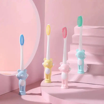 Set of four Little Bear Suction Cup Children's Toothbrushes by Zenn Organics Inc, featuring colorful handles and suction cups for easy grip.