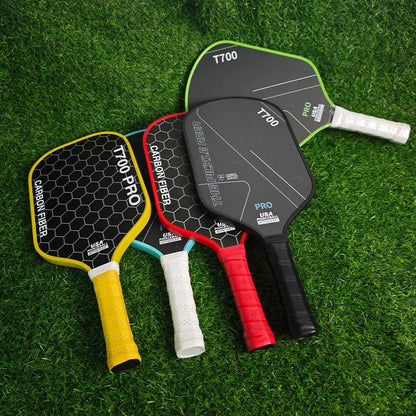 Zenn Organics T700 Carbon Pickleball Paddle with black and green design and textured surface for enhanced grip and control.