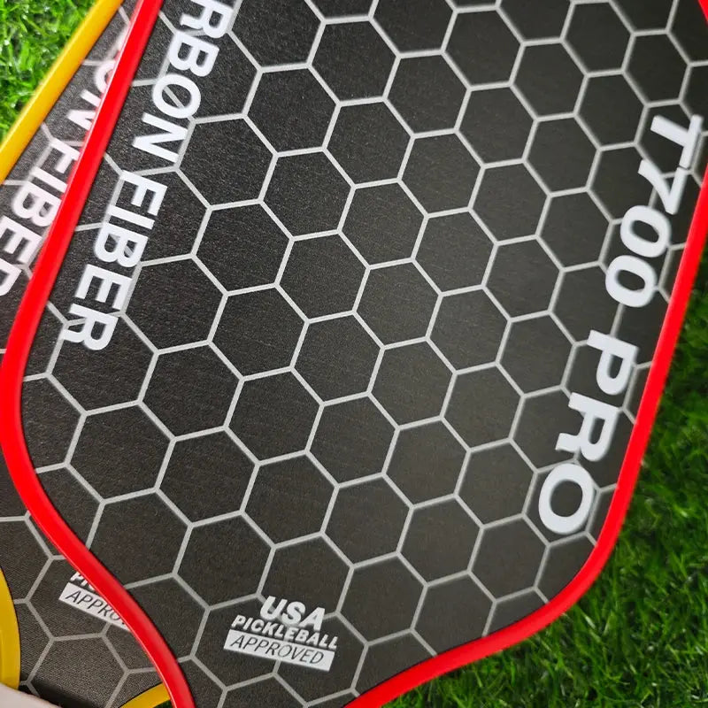 Zenn Organics Inc LEATOU T700 pickleball paddle with carbon fiber surface and 16mm polypropylene honeycomb core, ready for play