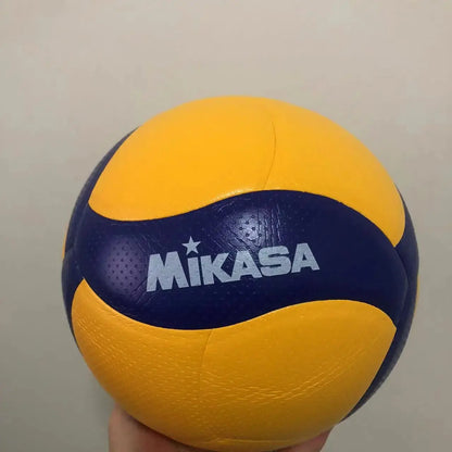 Zenn Organics Inc Original V200W V300W size 5 competition game volleyball with orange and white panels on a court.