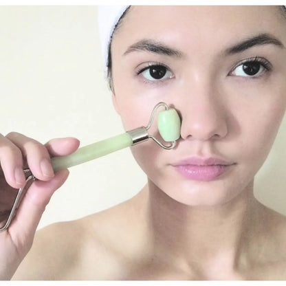 Double head jade face roller from Health & Beauty-5, showing smooth jade stones for facial massage and skincare.