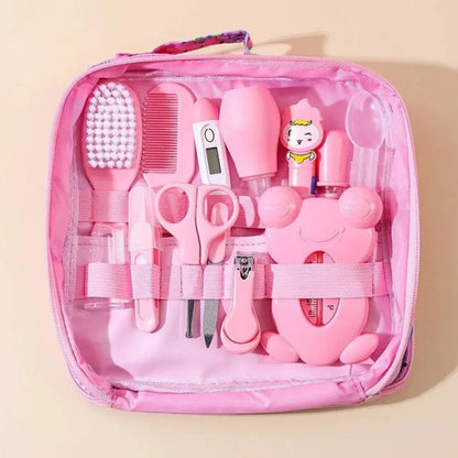 Set of 13 baby care essentials including hair wash brush, nail clipper, nasal aspirator, and comb by Zenn Organics Inc.