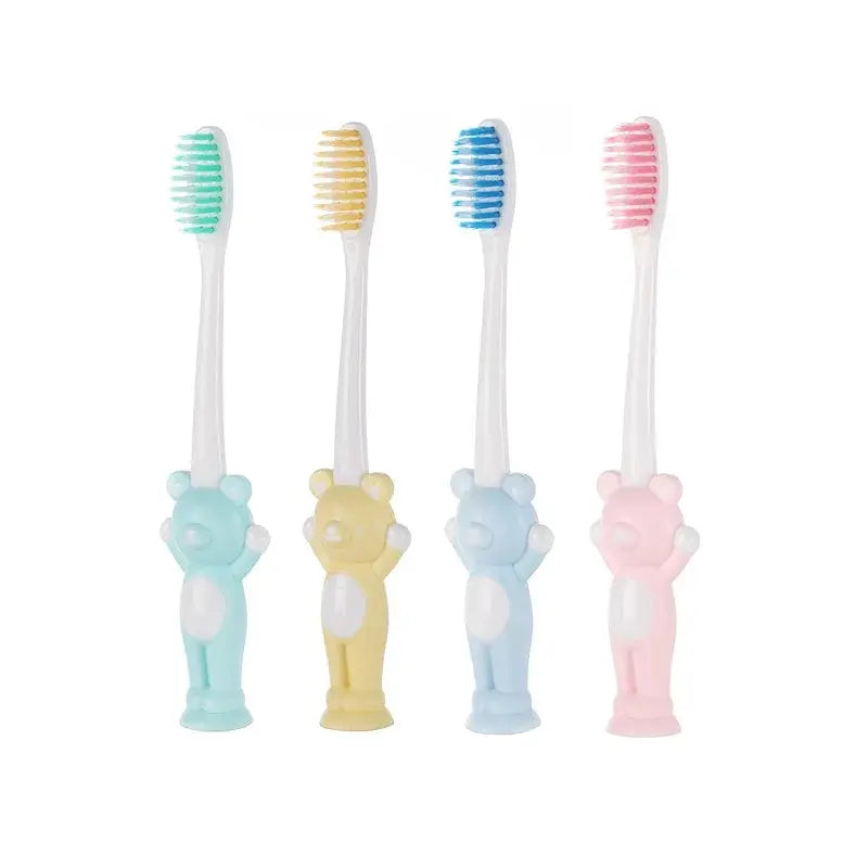 Set of four Little Bear Suction Cup Children's Toothbrushes by Zenn Organics Inc, featuring colorful handles and suction cups for easy grip.