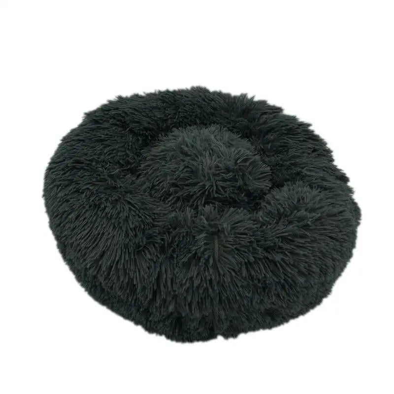 Pet Essentials-11 Calming Donut Bed for dogs and cats, soft cushioned round pet bed with raised edges for comfort and relaxation.