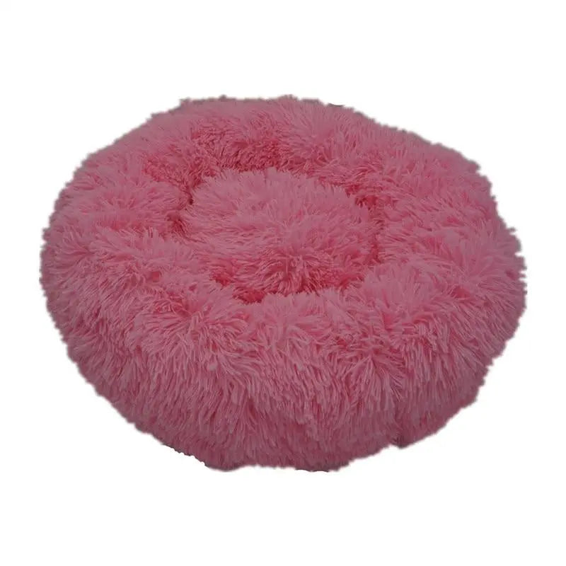 Soft Pet Essentials-11 Calming Donut Bed for dogs and cats, plush round bed with cozy bolstered edges for comfort and relaxation.