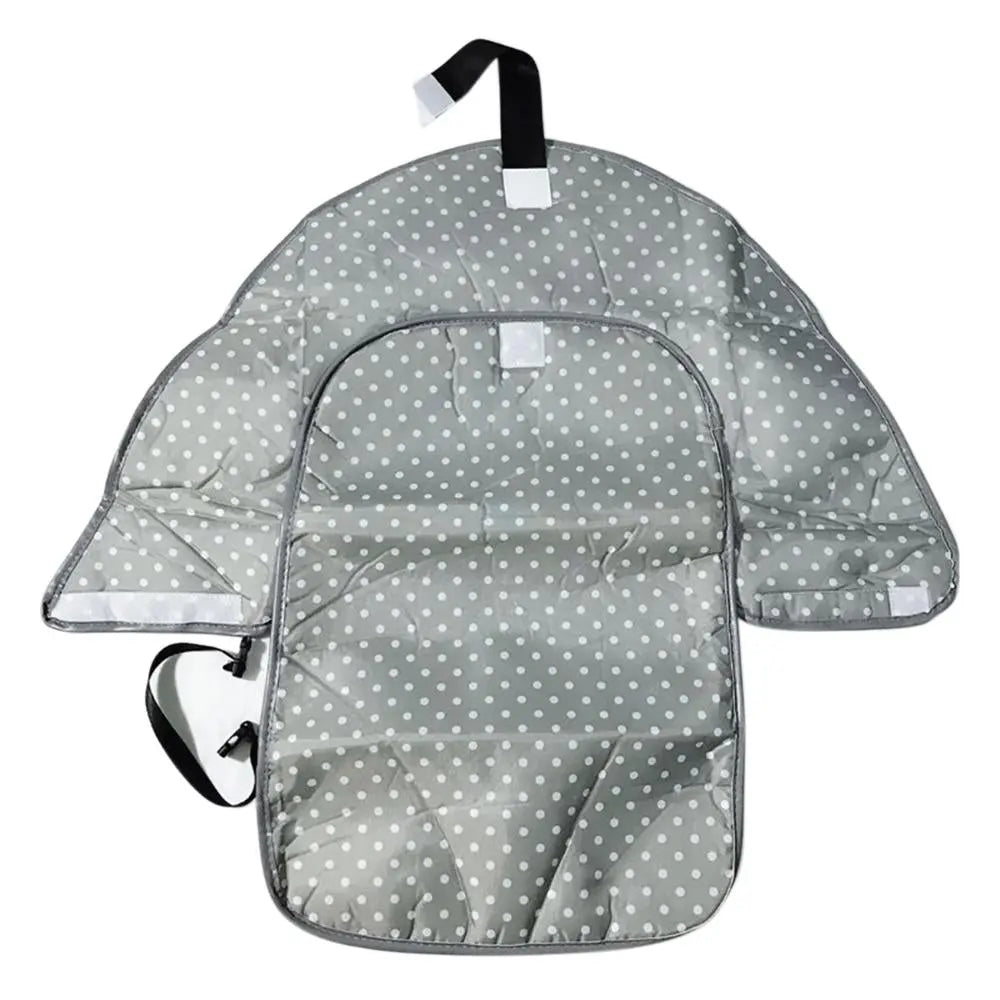 Baby Essentials-4 3-in-1 foldable diaper bag with built-in crib, showing the bag's storage compartments and compact design for travel.